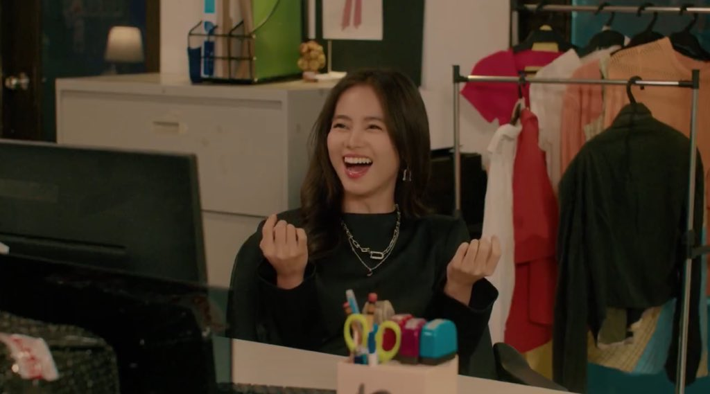 Ashtine Olviga laughing in a scene from the Viva One series Who's The Boss.